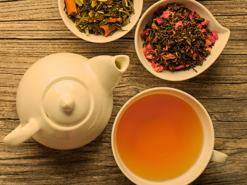 tea pot cup and tea leaves